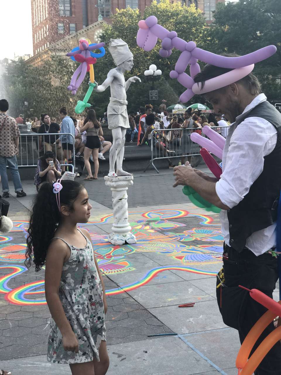 girl-India-Jolie-waiting-for-balloon-character-in-washington-square-park 